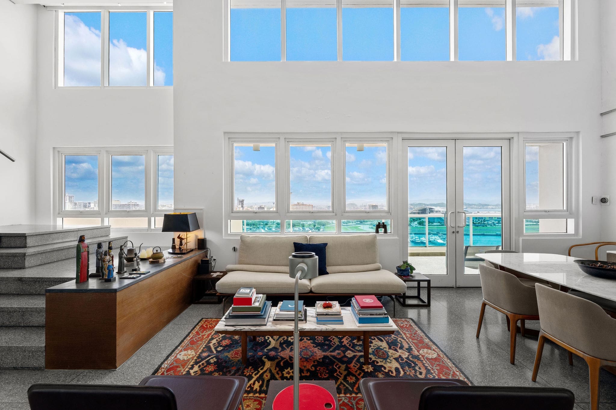 Open living area with panoramic views from Millenium Cond PH 1608 in San Juan